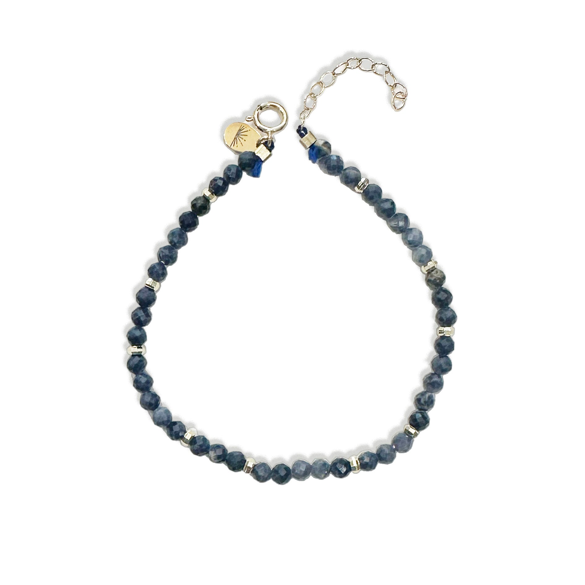 Bracelet with sapphire beads and a gold clasp on a white background